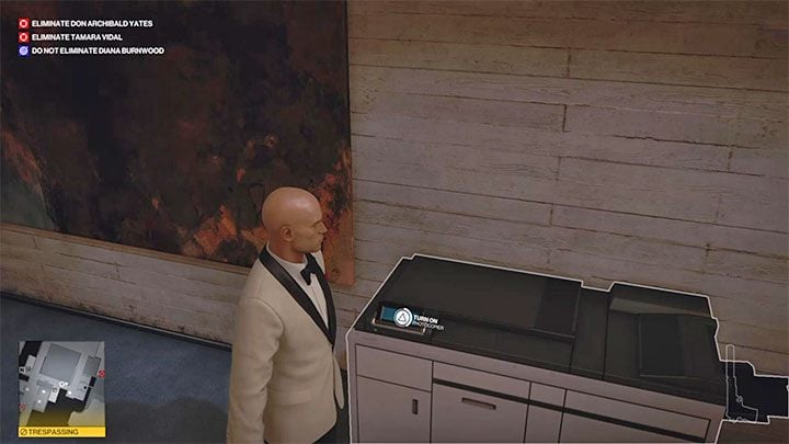 Explore the hallway southwest of the security room to find the photocopier shown in the picture - Hitman 3: Surveillance cameras - where to sabotage it? - The Farewell - Mendoza - Hitman 3 Guide