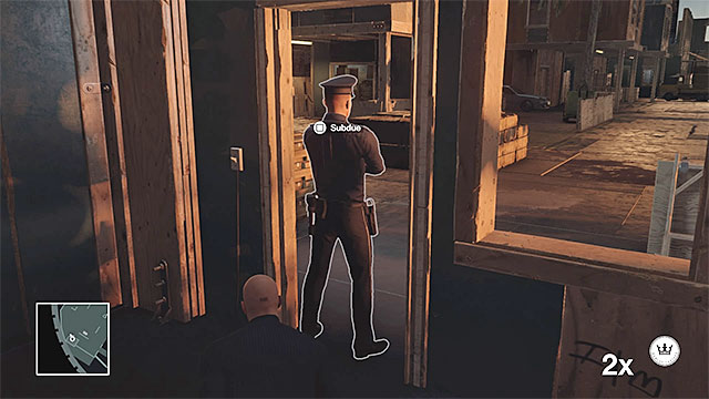 It is easiest to stun the guard from the gatehouse near the starting area - Disguises and important items | Freeform Training - Freeform Training - Hitman Game Guide
