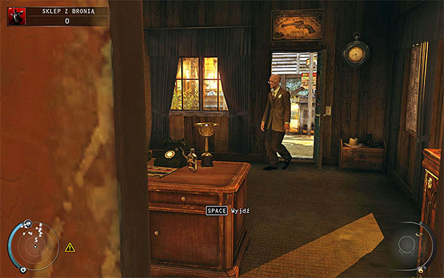 Go through the tunnel to find yourself in the office - Gun Shop - Getting the key to the cabinet | 8: Birdies Gift - 8: Birdies Gift - Hitman: Absolution Game Guide