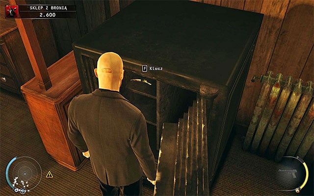 Regardless of your behavior, you have to open the safe and take a keycard to the cabinet out of it - Gun Shop - Getting the key to the cabinet | 8: Birdies Gift - 8: Birdies Gift - Hitman: Absolution Game Guide