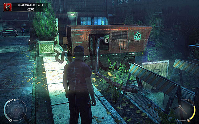 A guard mentioned above is patrolling a road leading to the partially flooded parking lot - Blackwater Park - Exploring surroundings of the residential building | 18: Blackwater Park - 18: Blackwater Park - Hitman: Absolution Game Guide
