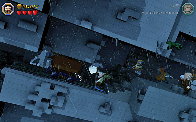 Use the warhammer to push the cart - Stage 6 (Over Hill and Under Hill): Climb the stone giant | Walkthrough - Walkthrough - LEGO The Hobbit Game Guide & Walkthrough