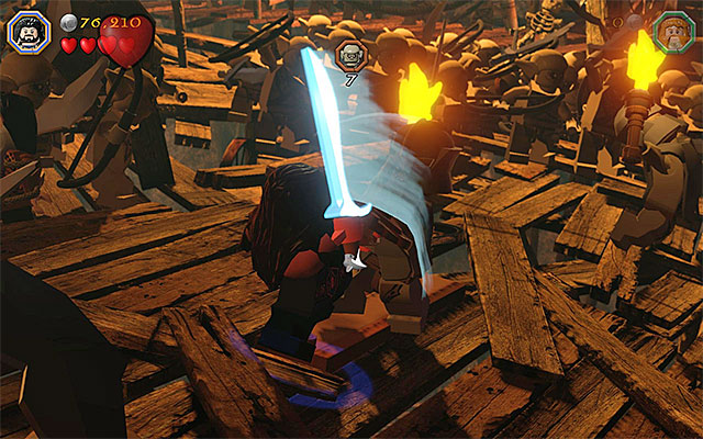 You need to eliminate then goblins - Stage 7 (Goblin-town): The first battle with Great Goblin | Walkthrough - Walkthrough - LEGO The Hobbit Game Guide & Walkthrough
