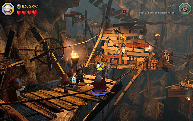 Reach the catch and lower the bridge - Stage 7 (Goblin-town): Escape from the goblin city | Walkthrough - Walkthrough - LEGO The Hobbit Game Guide & Walkthrough