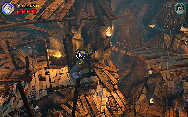 The rotary mechanism is a result of a successful building minigame - Stage 7 (Goblin-town): Escape from the goblin city | Walkthrough - Walkthrough - LEGO The Hobbit Game Guide & Walkthrough