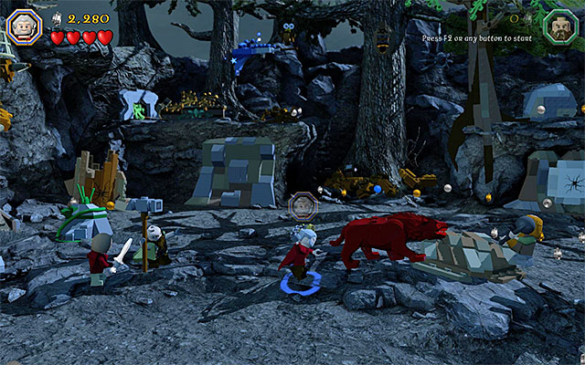 Land standard attacks at the wolves and avoid being bitten - Stage 8 (Out of the Frying Pan...): Escape the orcs | Walkthrough - Walkthrough - LEGO The Hobbit Game Guide & Walkthrough