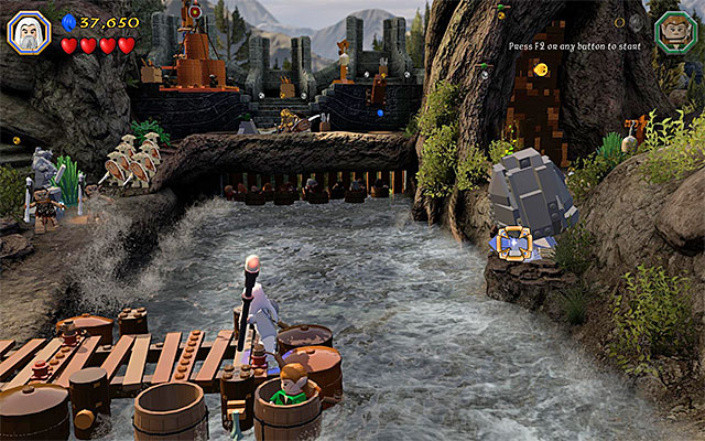 While completing the last, eleventh chapter of the game in the story mode, you have been unable to explore the stone ledge neighboring the first dam - Stage 11 (Barrels Out of Bond) | Main Stages - Collectibles - Main Stages - Collectibles - LEGO The Hobbit Game Guide & Walkthrough