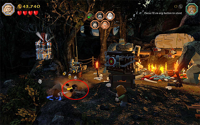 After the successful action, pick up the Flail from the ground and select it from the inventory - Stage 4 (Roast Mutton): Rescue the allies | Walkthrough | LEGO The Hobbit - Walkthrough - LEGO The Hobbit Game Guide & Walkthrough