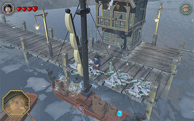 Toss fishes over to the ship - Middle-Earth: Make your way to Esgaroth | Walkthrough | LEGO The Hobbit - Walkthrough - LEGO The Hobbit Game Guide & Walkthrough