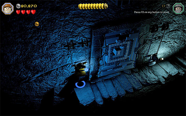 The catches are on the left and on the right side of the gate - Stage 13 (Looking for Proof): Angmars Tomb | Walkthrough - Walkthrough - LEGO The Hobbit Game Guide & Walkthrough