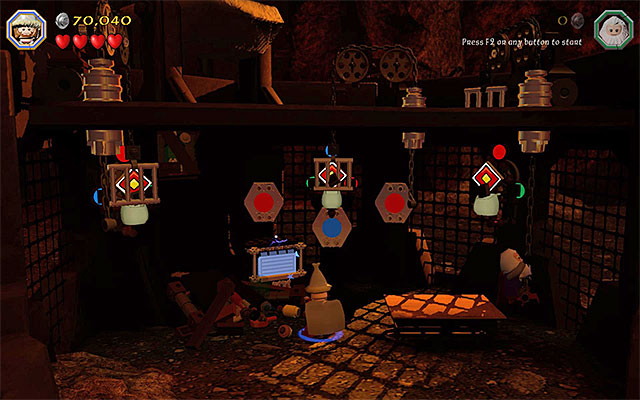 After you have revealed a target, switch to Ori and use his Slingshot - Stage 16 (Inside Information): Defeat Smaug | Walkthrough - Walkthrough - LEGO The Hobbit Game Guide & Walkthrough