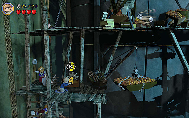 Use the knob to lower the load - Stage 16 (Inside Information): Defeat Smaug | Walkthrough - Walkthrough - LEGO The Hobbit Game Guide & Walkthrough