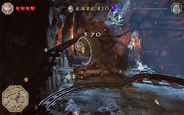 To fit into the middle of the rings, you need to press the jump key, at the appropriate moments - White question marks - walkthroughs for quests 41-60 | Middle Earth - Side missions - Middle Earth - Side missions - LEGO The Hobbit Game Guide & Walkthrough