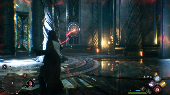 There is an interactive switch on the right side - hit it with a basic spell - it will turn the magical gate 180 degrees - Hogwarts Legacy: Charles Rookwoods Trial - Hogwarts Legacy: Main quests - Hogwarts Legacy Guide