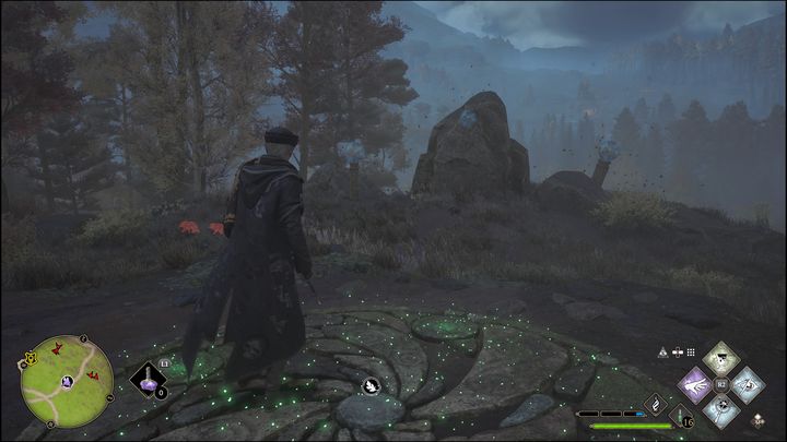 The test consists in destroying smaller stones that are located on the hill - Hogwarts Legacy: Hogwarts Valley - all Merlin Trials - Hogwarts Legacy: Merlins Trials - Hogwarts Legacy Guide