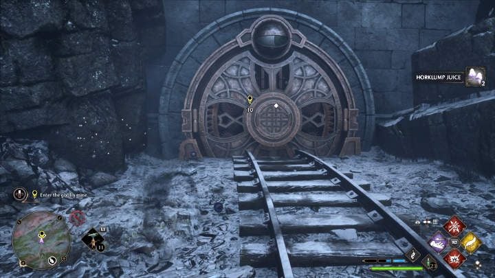 The mine door is guarded by an eye, so you'll need to use the Disillusionment spell to approach the entrance without being seen - Hogwarts Legacy: Its all Gobbledegook - Hogwarts Legacy: Main quests - Hogwarts Legacy Guide