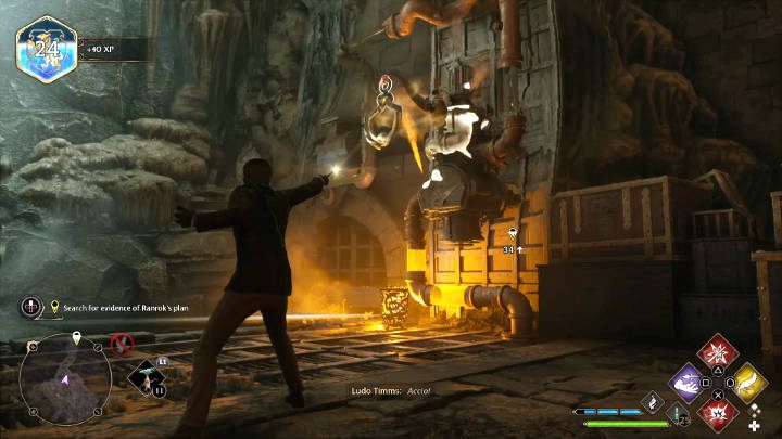 Use Accio on the handle shown in the picture above (to the right of the cauldron) to open the grate on the left that leads to the tunnels - Hogwarts Legacy: Its all Gobbledegook - Hogwarts Legacy: Main quests - Hogwarts Legacy Guide