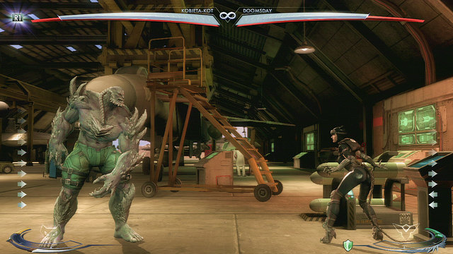 At the right edge of the arena theres a console with a button and a rocket vendor - Injustice Gods Among Us: Ferris Aircraft, arena guide - Arenas - Injustice: Gods Among Us Game Guide