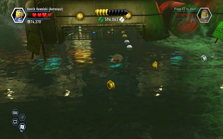 Swim under the bars in order to collect the token - Secrets in the bank | Walkthrough - Chapter 6 - LEGO City: Undercover Game Guide
