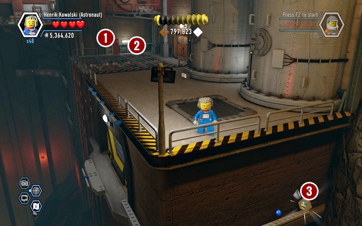 After getting across the large chasm you will find the final drawer (5/5) (1) and the penultimate flower (4/5) (2) - it is hidden inside the machine at the wall - Secrets in Rexs HQ | Chapter 13 | Walkthrough - Chapter 13 - LEGO City: Undercover Game Guide