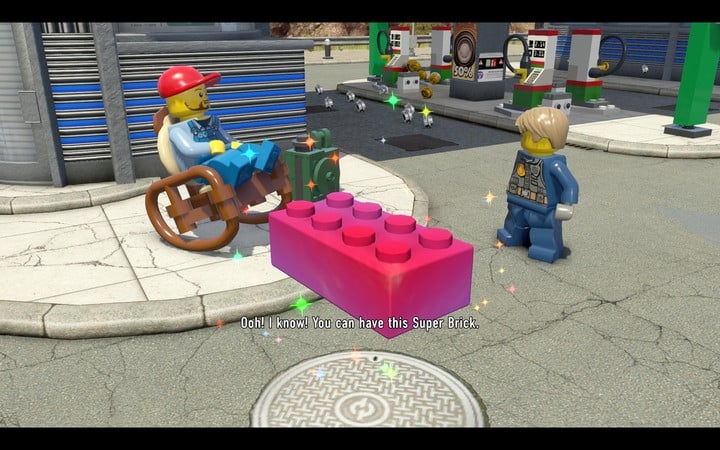 A Super Brick – from a distance you can mistake them for a red block, but these change colours - The beginning of the task | Chapter 2 - Chapter 2 - LEGO City: Undercover Game Guide