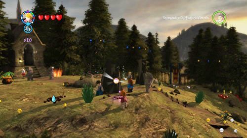 Immediately after leaving the castle, you can see a large scale with several dried plants on it - Harry Potter Years 5-7: Tokens - Hogwarts, part 6 - Tokens - LEGO Harry Potter Years 5-7 Guide