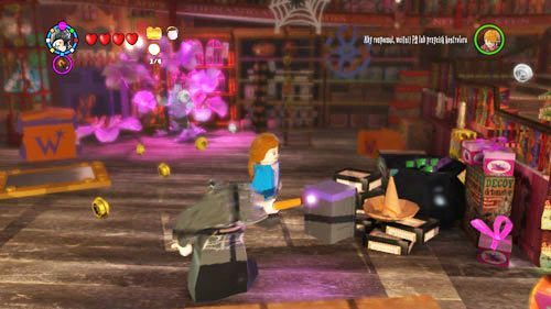 There is a pile of garbage on the right next to the cheat entry board - Harry Potter Years 5-7: Tokens - London, part 1 - Tokens - LEGO Harry Potter Years 5-7 Guide