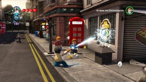 Find graffiti (Lego head) on the right - Harry Potter Years 5-7: Tokens - London, part 1 - Tokens - LEGO Harry Potter Years 5-7 Guide