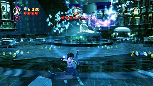 When you are attacked by the sharp glass pieces try to hind behind Dumbledore - Harry Potter Years 5-7: A Veiled Threat - Year 5 - LEGO Harry Potter Years 5-7 Guide