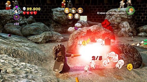 You get another part by destroying all five black-and-red rocks on the square where the battle takes place - Harry Potter Years 5-7: A Veiled Threat - secrets, collectibles - Year 5 - LEGO Harry Potter Years 5-7 Guide