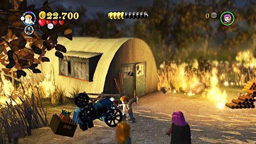 A carrot machine is at the very end of the square, near the warehouse - Harry Potter Years 5-7: A Not So Merry Christmas - secrets, collectibles - Year 6 - LEGO Harry Potter Years 5-7 Guide