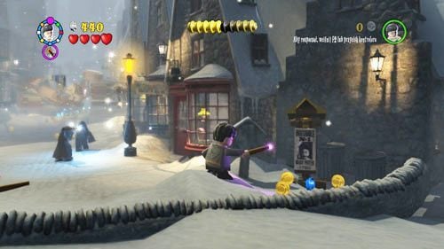 After reaching Hogsmeade street, shoot three wanted posters depicting Harry to get the first part of the crest - Harry Potter Years 5-7: Back to School - secrets, collectibles - Year 7 - LEGO Harry Potter Years 5-7 Guide