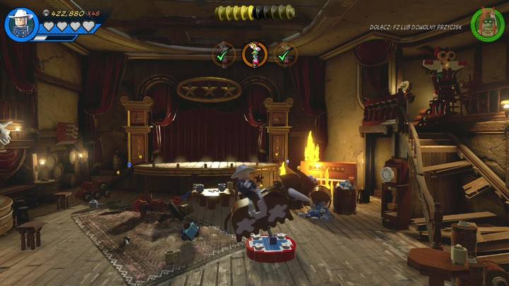 Go on the balcony and use Rawhide Kids lasso to destroy another totem - LEGO Marvel 2: Mission 5 - Toe-to-Totem - LEGO Marvel 2: Gwenpools missions - LEGO Marvel Super Heroes 2 Game Guide