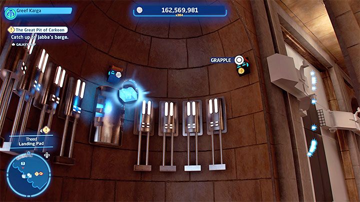 The collectible you are looking for is levitating high up in the air near one of the hangar walls - LEGO Skywalker Saga: Theed - list of all puzzles - LEGO Skywalker Saga: Naboo - LEGO Skywalker Saga Guide