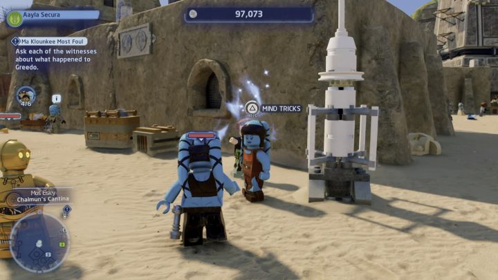While controlling any Jedi character, approach the character from the hologram, who will be standing near the house, by the white rocket - LEGO Skywalker Saga: Ma Klounkee Most Foul - walkthrough, description - LEGO Skywalker Saga: Tatooine - Mos Eisley - LEGO Skywalker Saga Guide