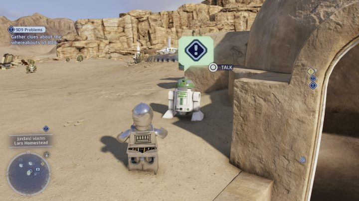 You will receive another clue from the astromechanical droid standing at the entrance to the building - LEGO Skywalker Saga: 9D9 Problems - walkthrough - LEGO Skywalker Saga: Tatooine - the desert of Jundland - LEGO Skywalker Saga Guide