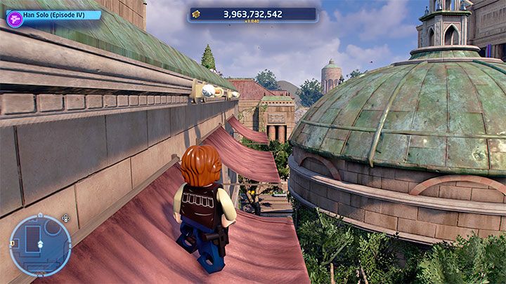 Find the ladder from screenshot 1 and use it to reach the roof of one of the buildings here - LEGO Skywalker Saga: Wheres the Wookiee? - list of all (part 2) - LEGO Skywalker Saga: Challenges - LEGO Skywalker Saga Guide