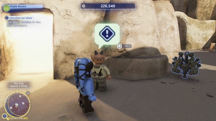 Fly to Mos Espa on the planet Tatooine and talk to the man standing at the city gate - LEGO Skywalker Saga: Wheelbarrow Woes - walkthrough - LEGO Skywalker Saga: Ahch-To - Island with a temple - LEGO Skywalker Saga Guide