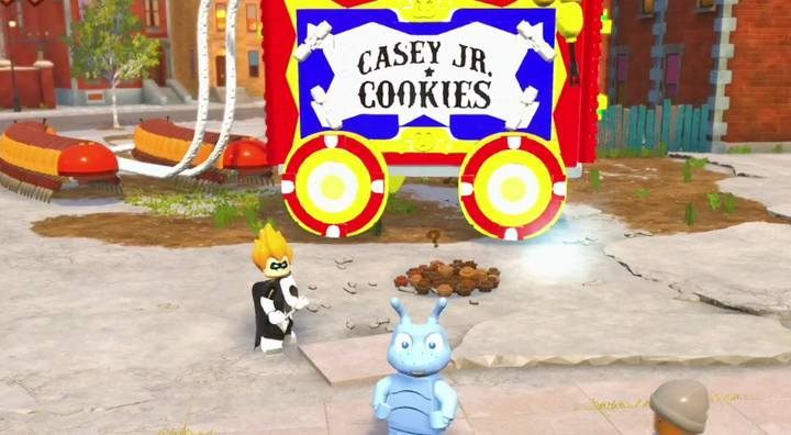 Complete the build in the Urbem Heights district and pick up the red brick, now the secrets wont be a problem. - How do I collect secrets and get achievements in LEGO The Incredibles? - FAQ - LEGO The Incredibles Game Guide