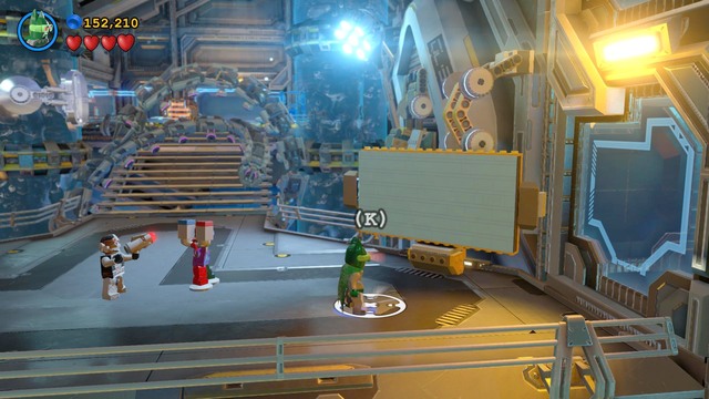 After getting through the door, head toward the green wall as Batman, and align the bricks there in a line in the center - Space Station Infestation - Walkthrough - LEGO Batman 3: Beyond Gotham - Game Guide and Walkthrough