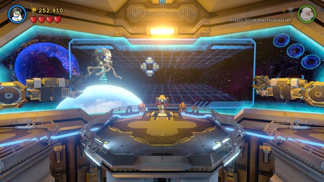 Wearing the Techno Suit as Robin use the console in the center and move the cursor at the Brainiacs ship to eject the docking tunnel - Space Station Infestation - Walkthrough - LEGO Batman 3: Beyond Gotham - Game Guide and Walkthrough