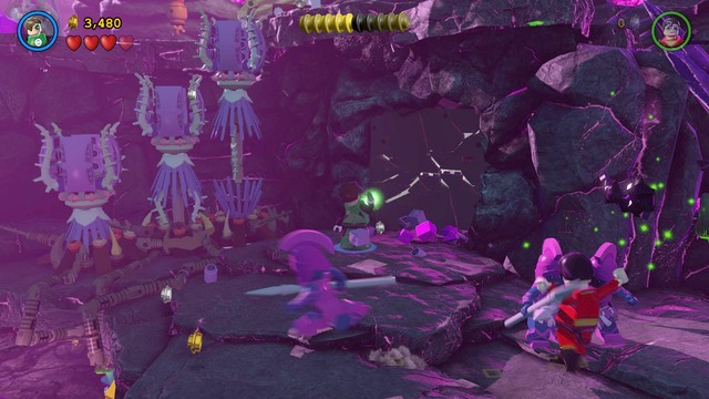 When unlocking the way up (using the flowers), you will notice a glowing wall near you - Minikits - Power of Love - secrets - LEGO Batman 3: Beyond Gotham - Game Guide and Walkthrough