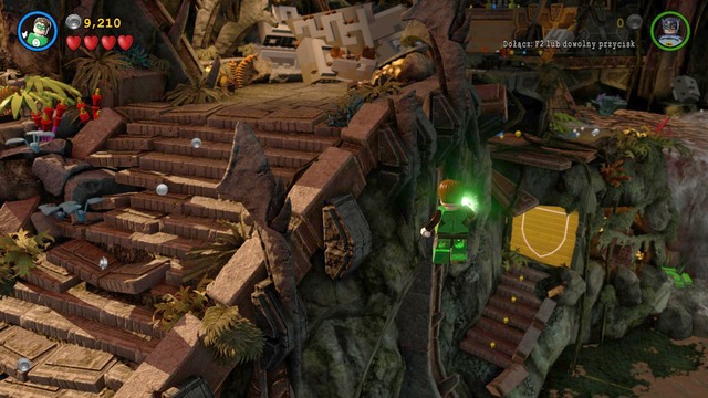 You will find the fourth Minikit behind the gold door shown in the picture - Minikits - Need for Greed - secrets - LEGO Batman 3: Beyond Gotham - Game Guide and Walkthrough