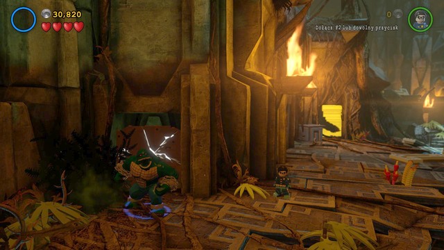 After obtaining the seventh Minikit, go to the left side of the cave and you will find a glowing wall here - Minikits - Need for Greed - secrets - LEGO Batman 3: Beyond Gotham - Game Guide and Walkthrough