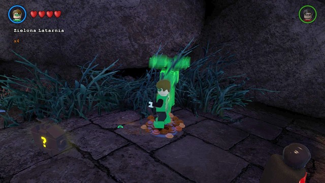 In the cave, approach the pile of dirt and dig up a Character Token - Characters and vehicles - Nok - secrets - LEGO Batman 3: Beyond Gotham - Game Guide and Walkthrough