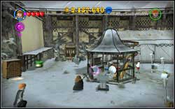 (Time Travel) Next to the tent you will find a digging spot - switch to Hermione and use Crookshanks to dig up the stand - LEGO Harry Potter Years 1-4: Hogwarts Bonuses - Walkthrough - Secrets and Collectibles - LEGO Harry Potter Years 1-4 Guide & Walkthrough