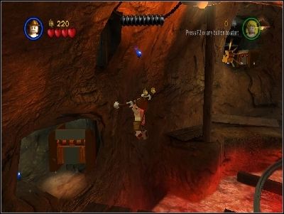 Go in that direction jumping with the rope and using brown bars - Chapter 4 - Free the Slaves - part 1 - The Temple of Doom - LEGO Indiana Jones: The Original Adventures - Game Guide and Walkthrough