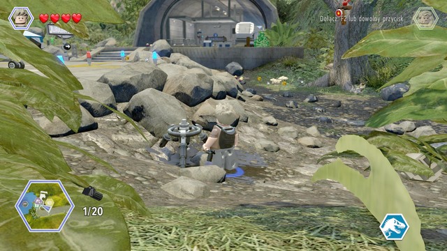 The tripod can be found next to the helicopter - Isla Nubar Helipad | Jurassic Park - secrets in free roam - Jurassic Park - secrets in free roam - LEGO Jurassic World Game Guide & Walkthrough