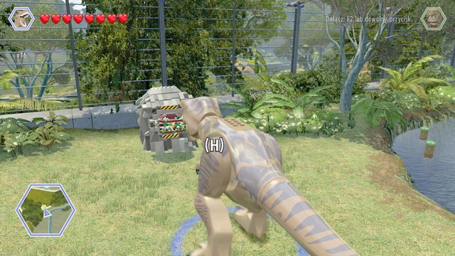 As tyrannosaurus, walk to the brick object shown on the picture and use your strength to destroy it - Triceratops Territory | Jurassic Park - secrets in free roam - Jurassic Park - secrets in free roam - LEGO Jurassic World Game Guide & Walkthrough