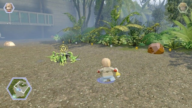 As Eric, throw the tyrannosaurus smell to scare the compsognathuses away - Indominus Territory | Jurassic World - secrets in free roam - Jurassic World - secrets in free roam - LEGO Jurassic World Game Guide & Walkthrough